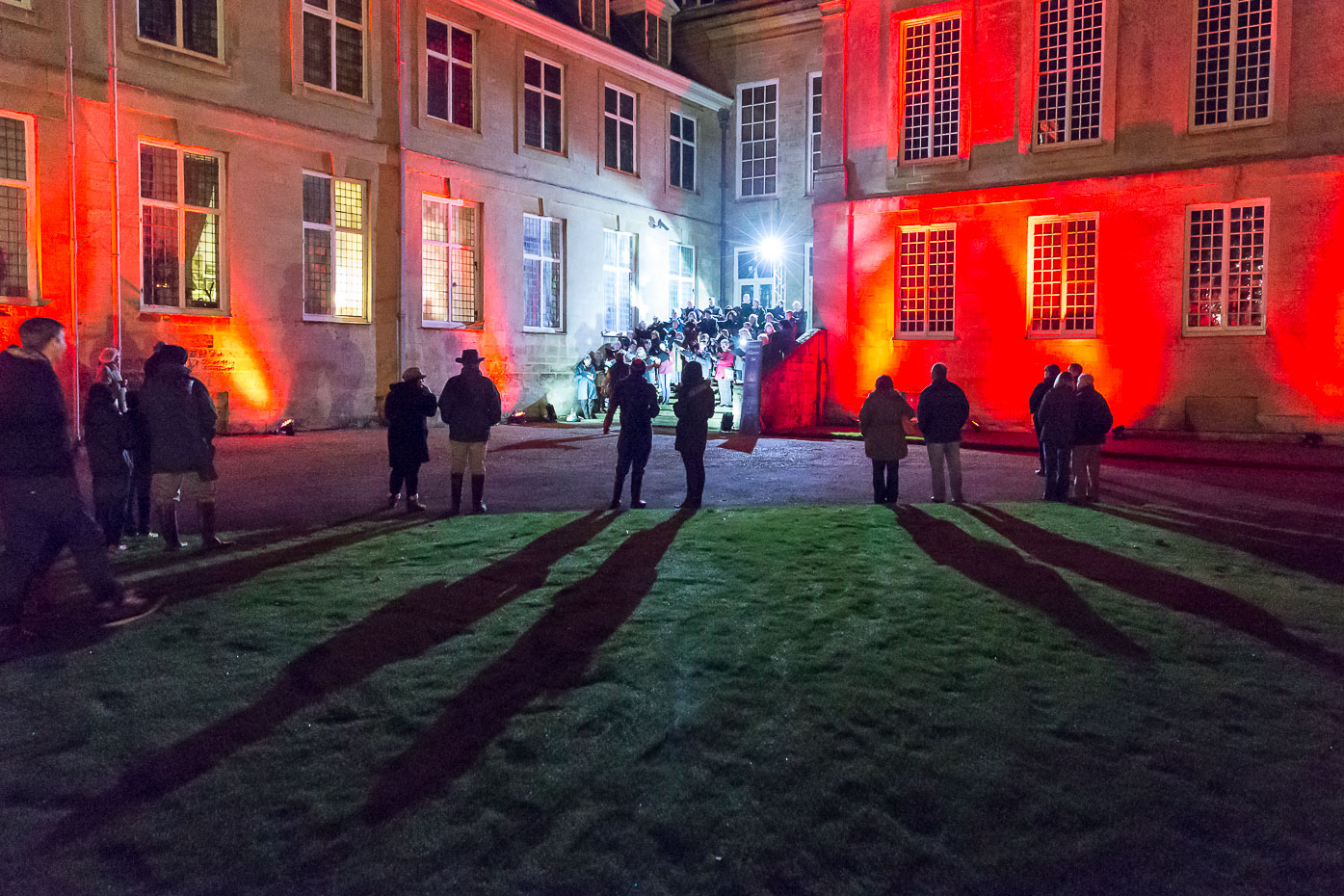 Boughton House 'Gunpowder, Treason and Plot' event, November 2014< >The choir assembled on the steps at Boughton House
